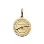 Gold pendant with 'north pole' and 'official' text on a white background